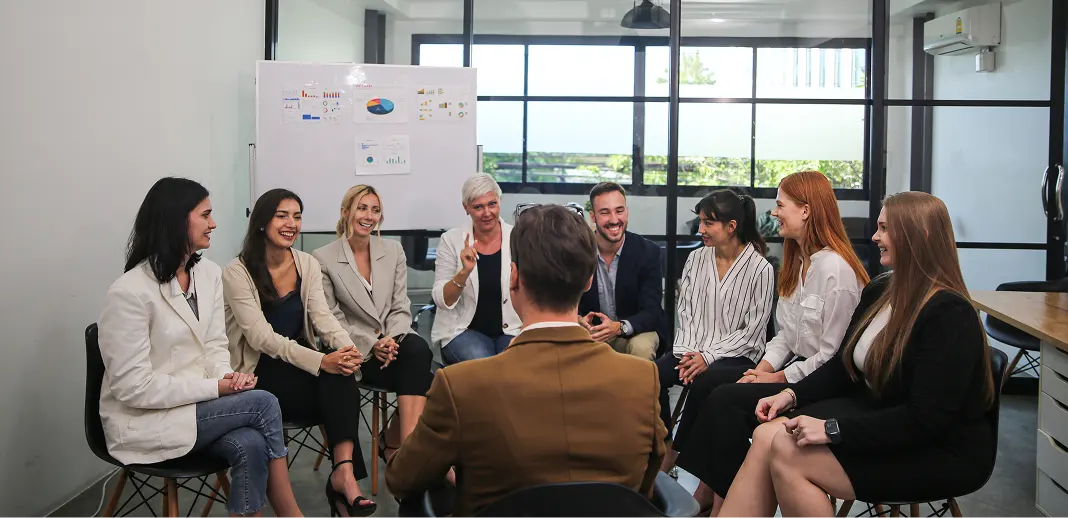 young businessman speaking in meeting